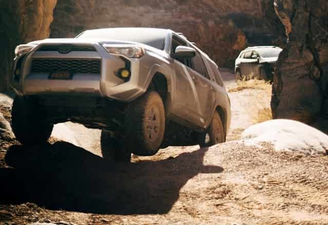 ways to reconnect with employees; a 4x4 off roading in a rocky course